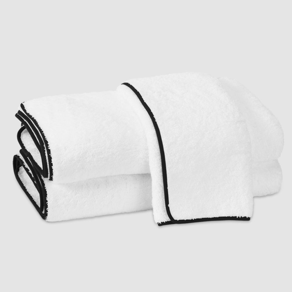 white bath towels with black trim