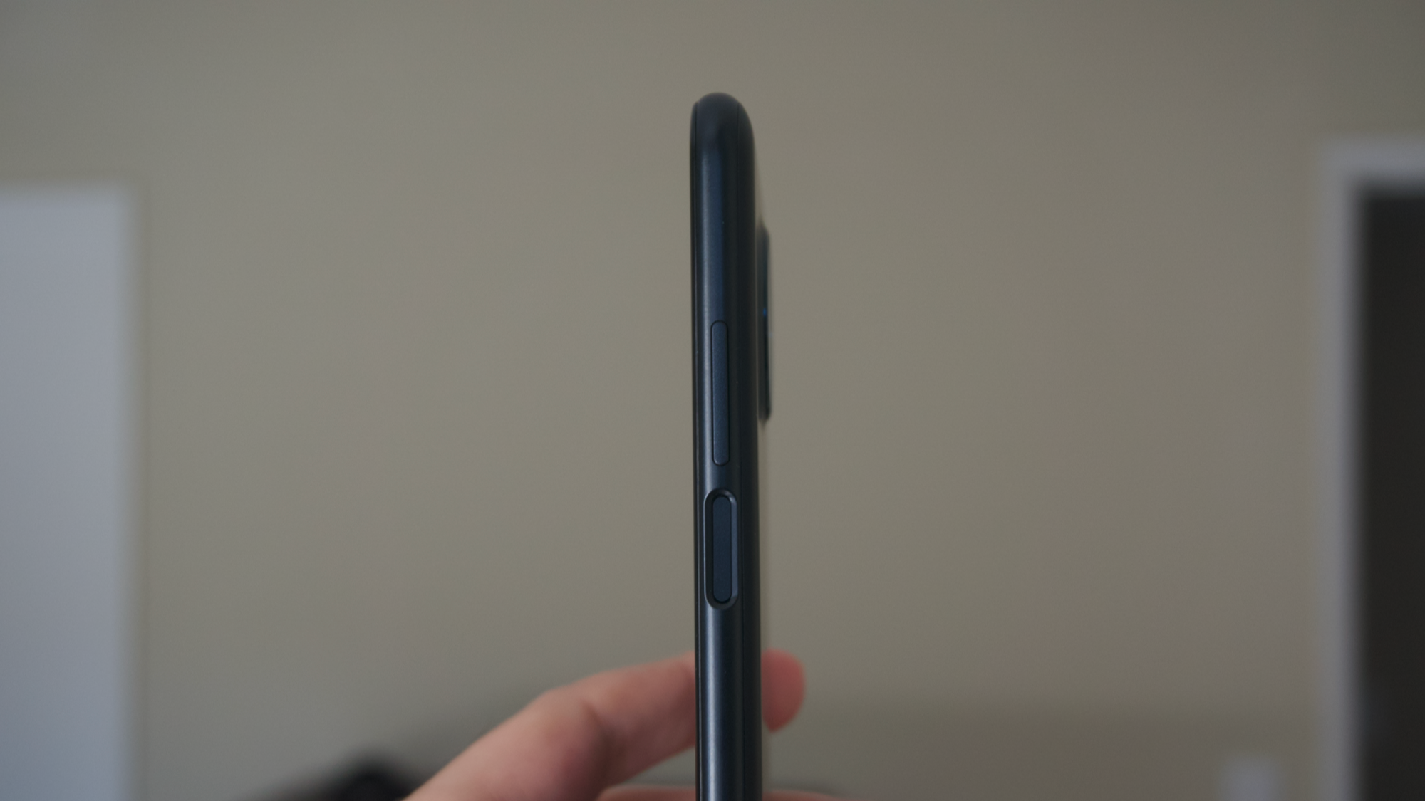 The power button, fingerprint sensor, and volume rocker on the Nokia X100