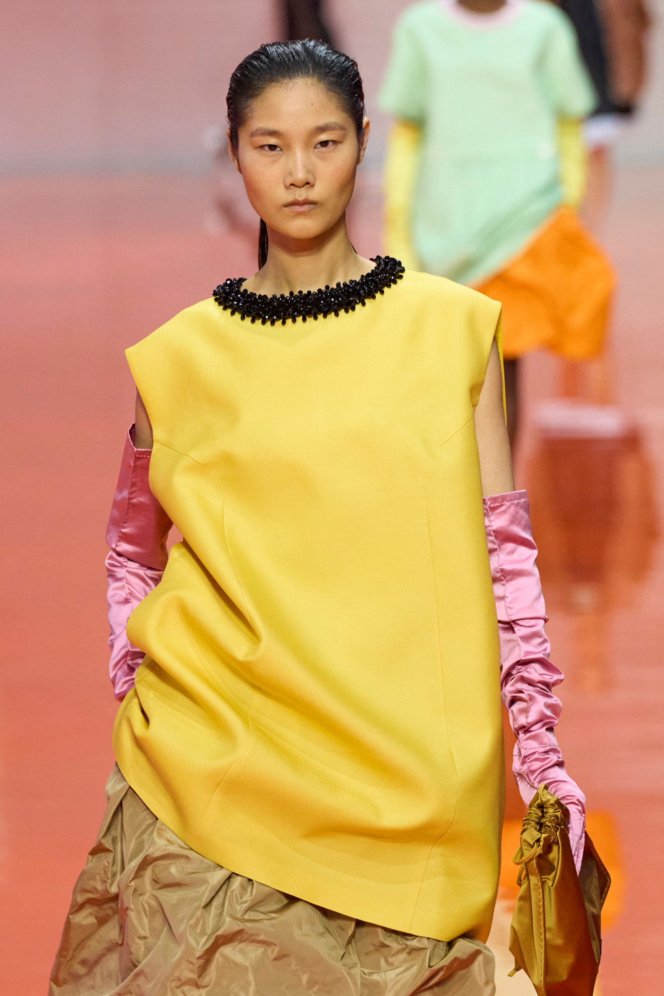 models wearing bead and gem embellished tops on the Prada spring 2026 runway