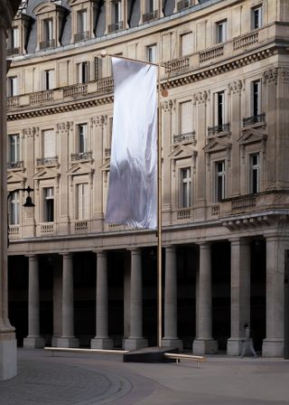new sleek flags and benches are placed around the Bourse, designed by the Bouroulec brothers