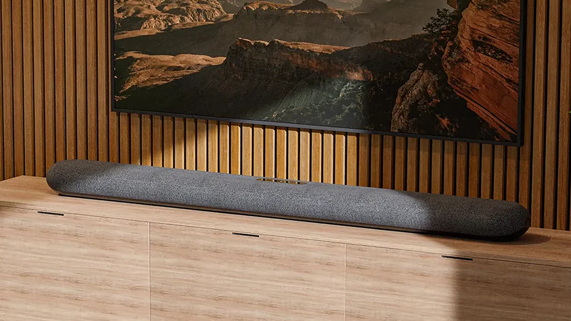 The Bluesound Pulse Cinema on an entertainment center.