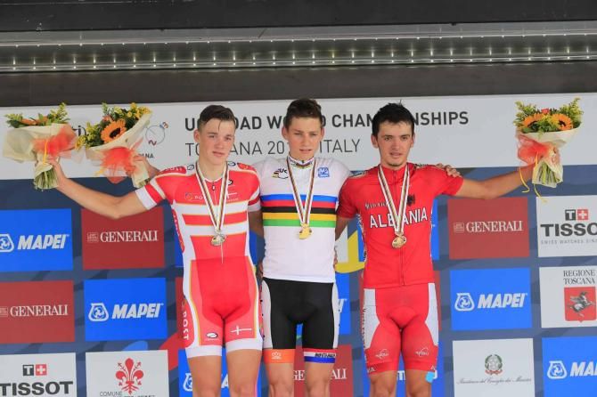 Mathieu van der Poel (Netherlands) with Mads Pedersen (Denmark) and Iltjan Nika (Albania) on the podium after the junior men's road race in Florence.