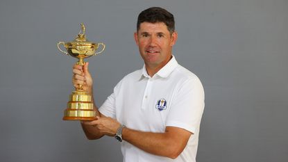 Padraig Harrington holds the Ryder Cup trophy