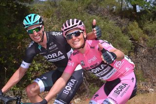 Lukas Pöstlberger and Rüdiger Selig mugging for the camera at the Giro d'Italia