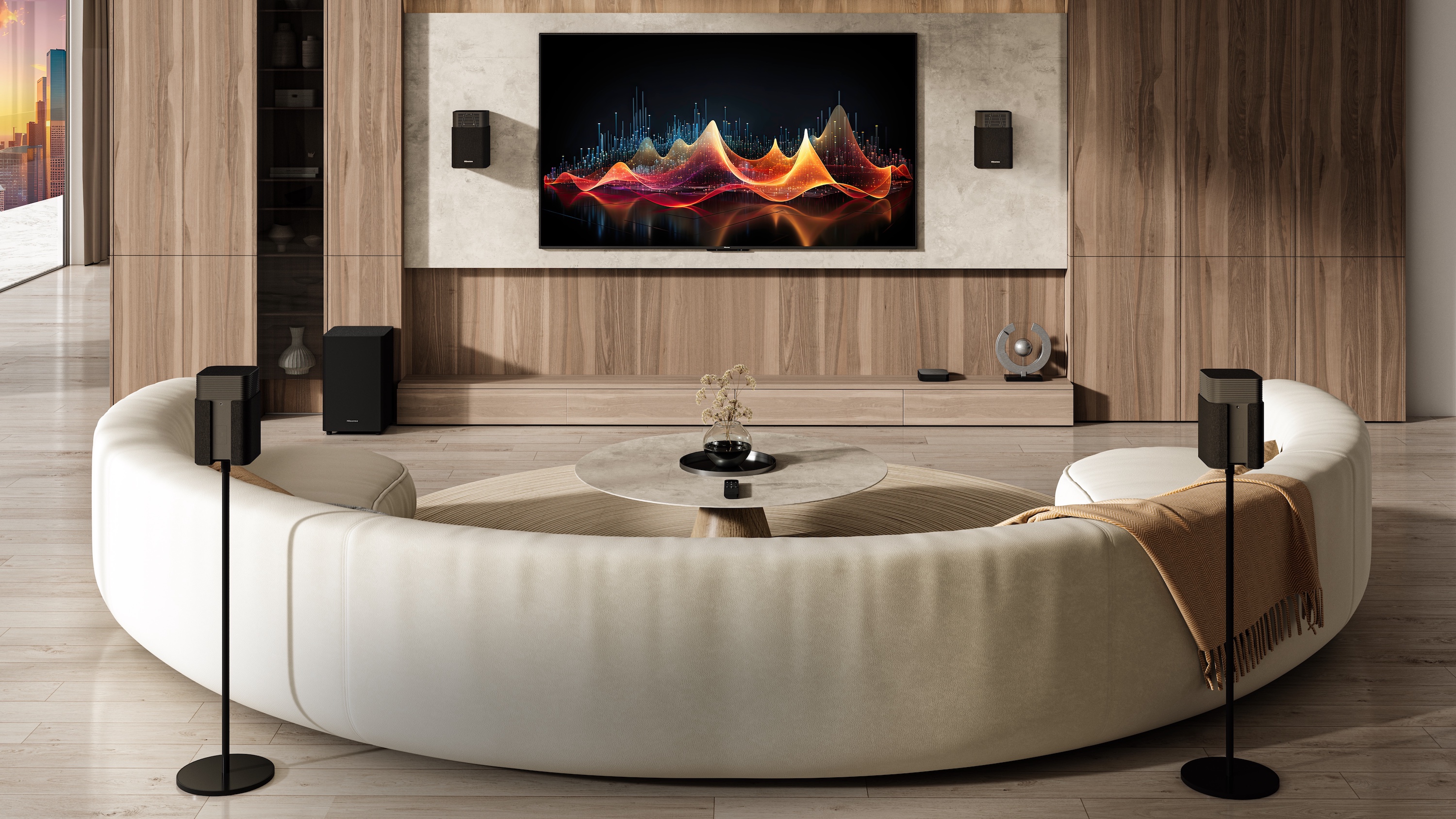 The Hisense HT Saturn sound system with a wall-mounted TV in a modern lounge with a semi-circular sofa.