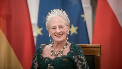 Queen Margrethe strips half of her grandchildren of titles, seen here attending a state banquet in Bellevue Palace
