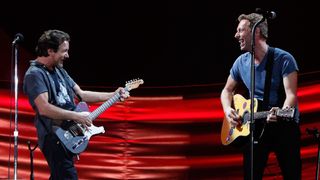 Eddie Vedder (left) and Chris Martin