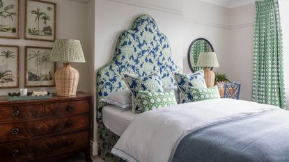 Grey bedroom with green bed