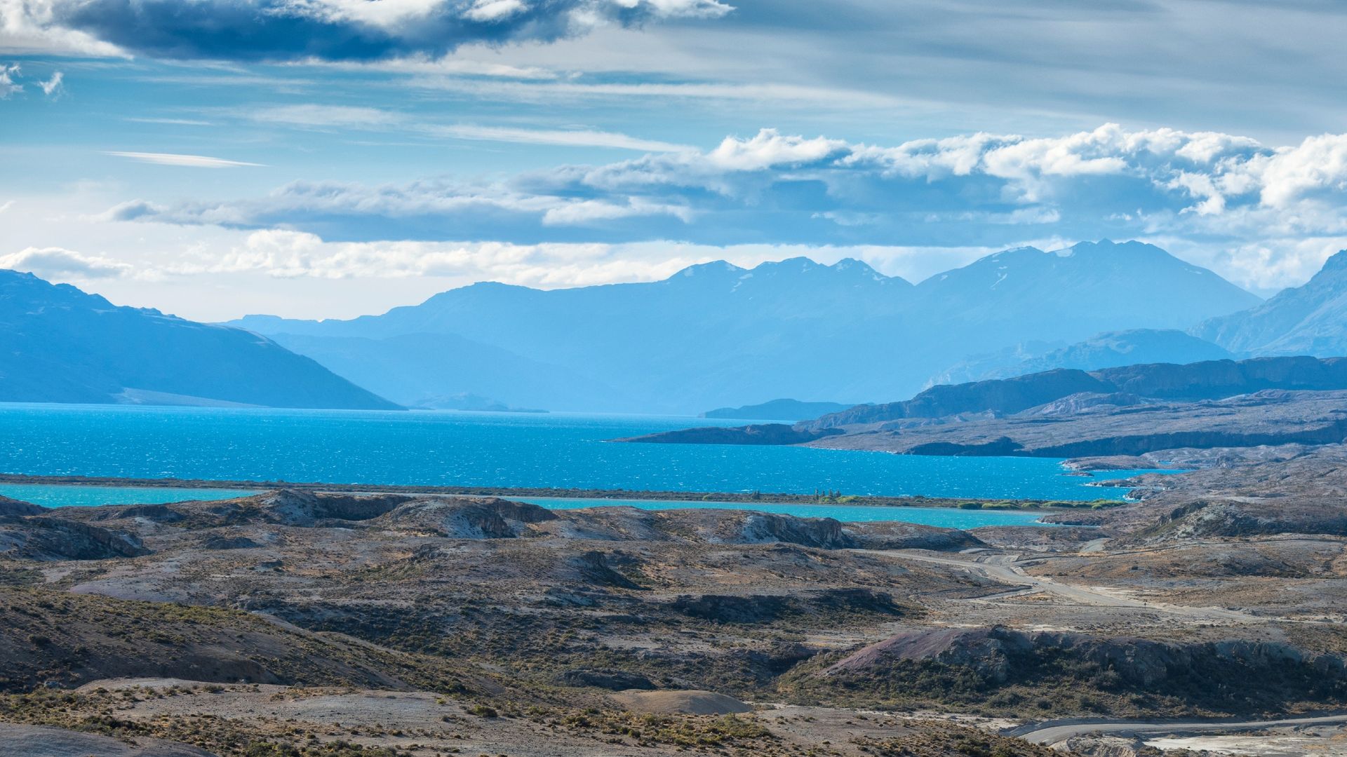 A photo of the lakes and the land bridge that separates them, taken from ground level