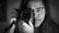 Photographer James Artaius holding a Leica Q3 Monochrom