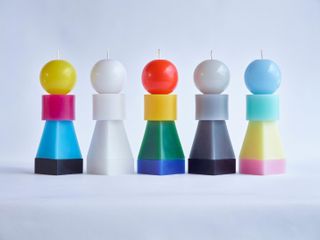 Line-up of first edition Re-Or interchangeable candles by BCXSY