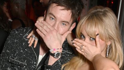 Barry Keoghan and Sabrina Carpenter covering their faces