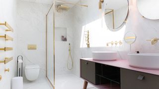 small wet room with brass fittings