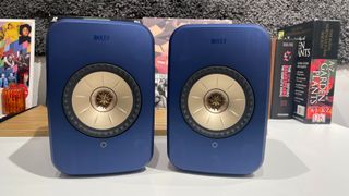 KEF LSX II speakers in blue finish placed on desk