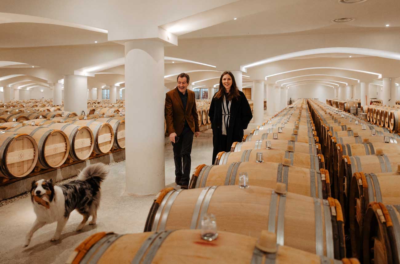 Caroline Frey and Peter Gago in the Rh&amp;ocirc;ne cellars with Frey's dog Lucky