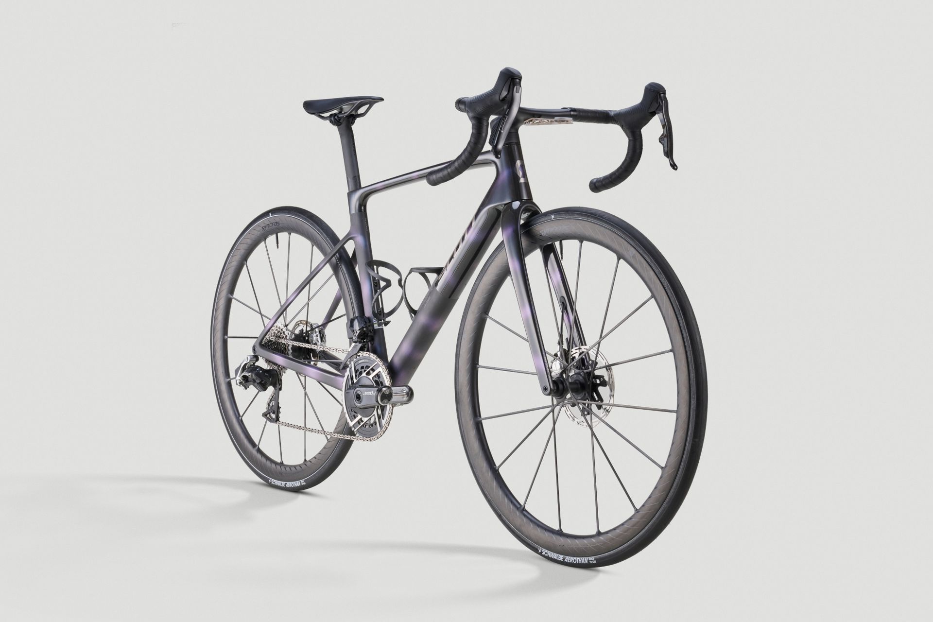 Scott Addict RC purple race bike shot on grey background