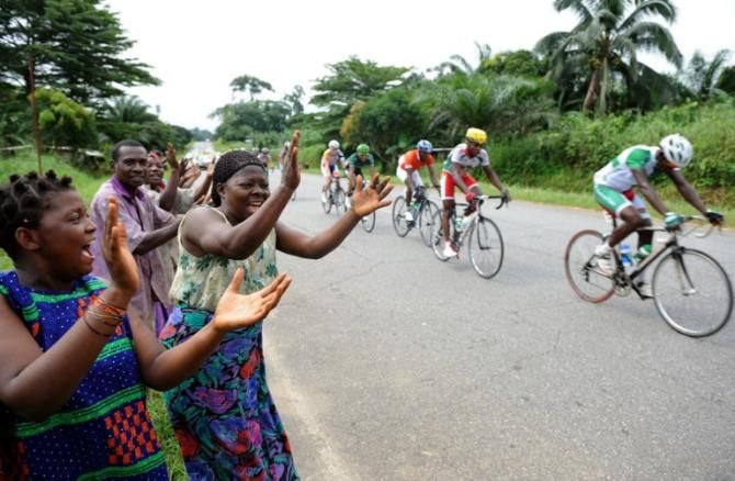 Fans cheer on the riders on stage six of the Tropicale Amissa Bongo in Gabon.