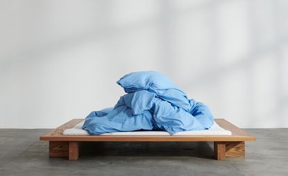 Dove blue organic cotton percale bedding, by Tekla