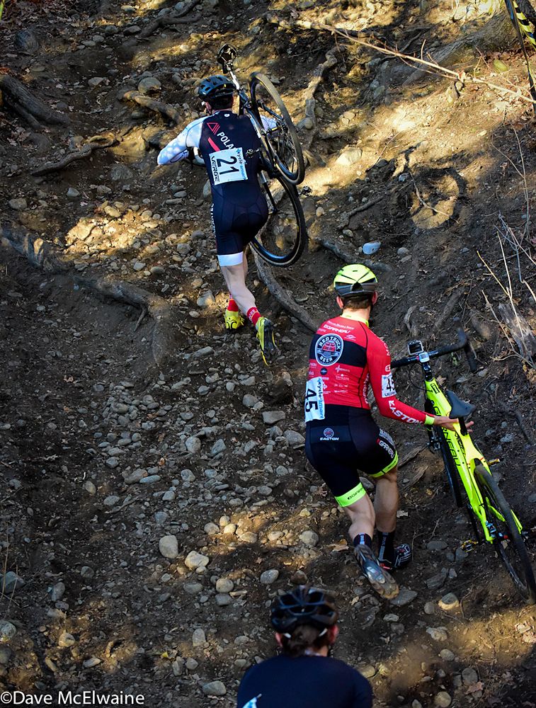 Dillon McNicholas (Polartec) leading Saturday&rsquo;s winner Michael Van Den Ham on the steep run-up
