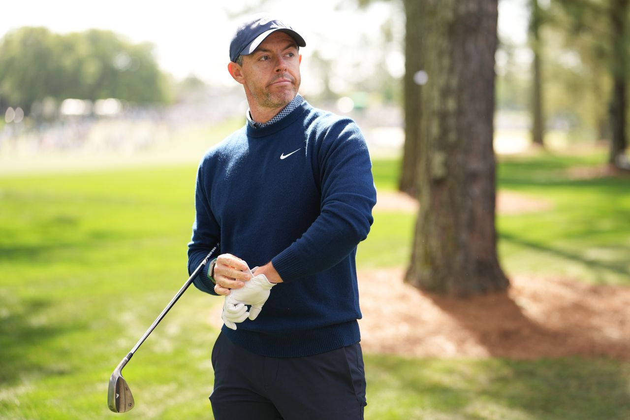 Rory McIlroy of Northern Ireland stands near his ball on the first hole during the first round of Masters Tournament at Augusta National Golf Club