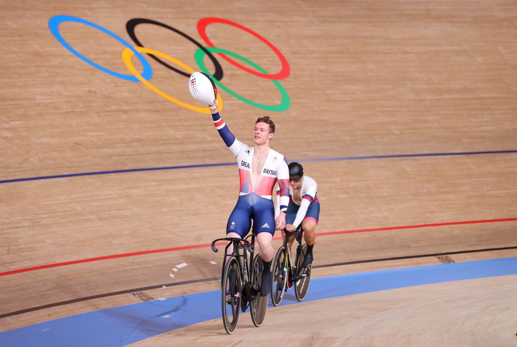 IZU JAPAN AUGUST 06 Jack Carlin of Team Great Britain celebrates winning a bronze medal ahead of Denis Dmitriev of Team ROC during the Mens sprint finals race 2 heat 1 of the track cycling on day fourteen of the Tokyo 2020 Olympic Games at Izu Velodrome on August 06 2021 in Izu Japan Photo by Justin SetterfieldGetty Images