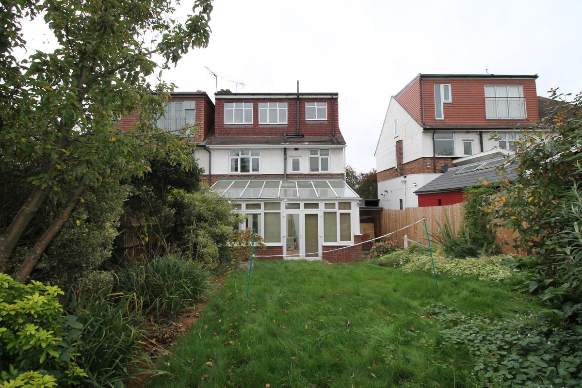 old upvc conservatory on 1930s semi