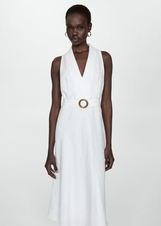 A model wears a white Belt Linen Dress with O-ring closure