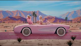 Barbie and Ken in their pink Corvette