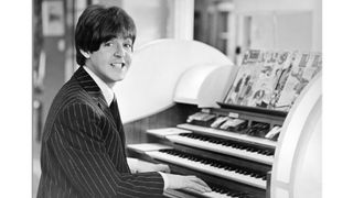 Bassist Paul McCartney of the rock and roll band "The Beatles" plays an organ in circa 1965