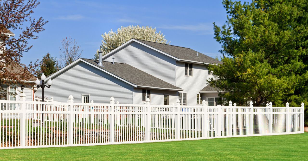 vinyl picket fence around a property