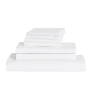 Brooklinen Luxe Sateen Core Sheet Set in white, folded