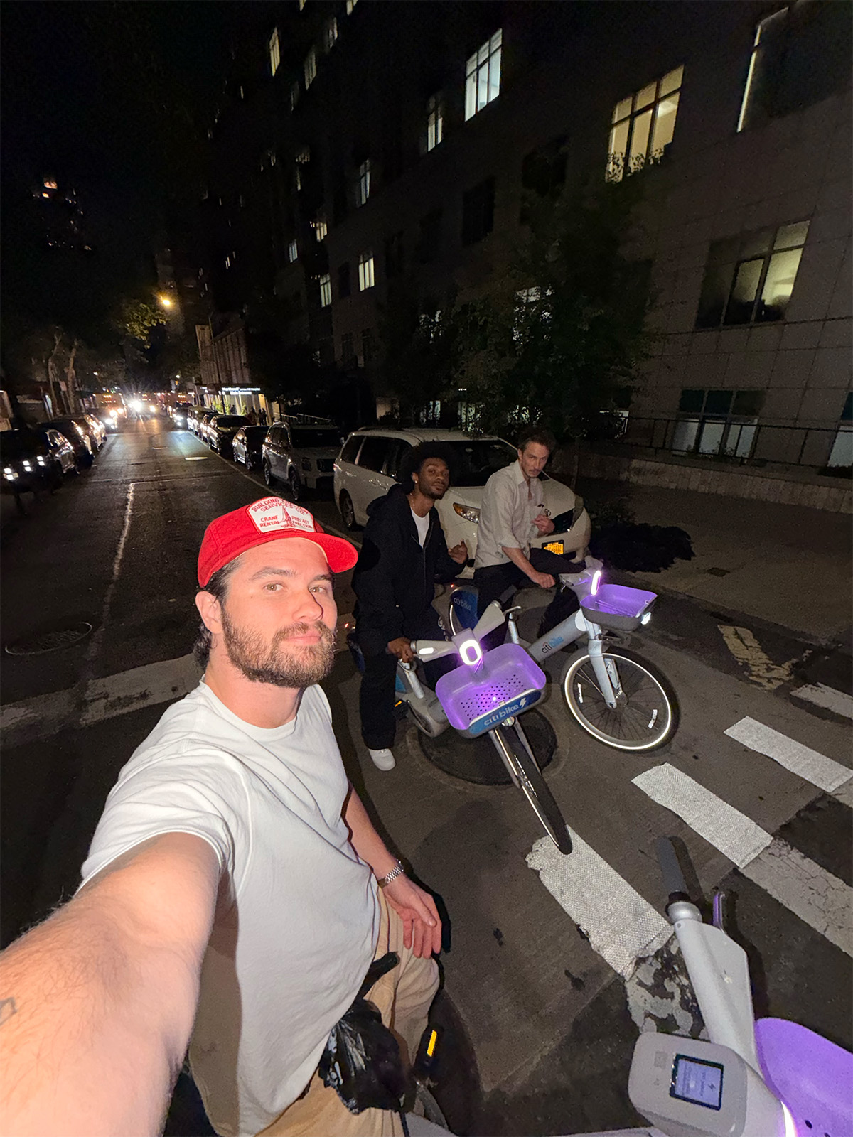 Chase Stokes, Jonathan Daviss, and Drew Starkey ride Citi bikes in New York City.