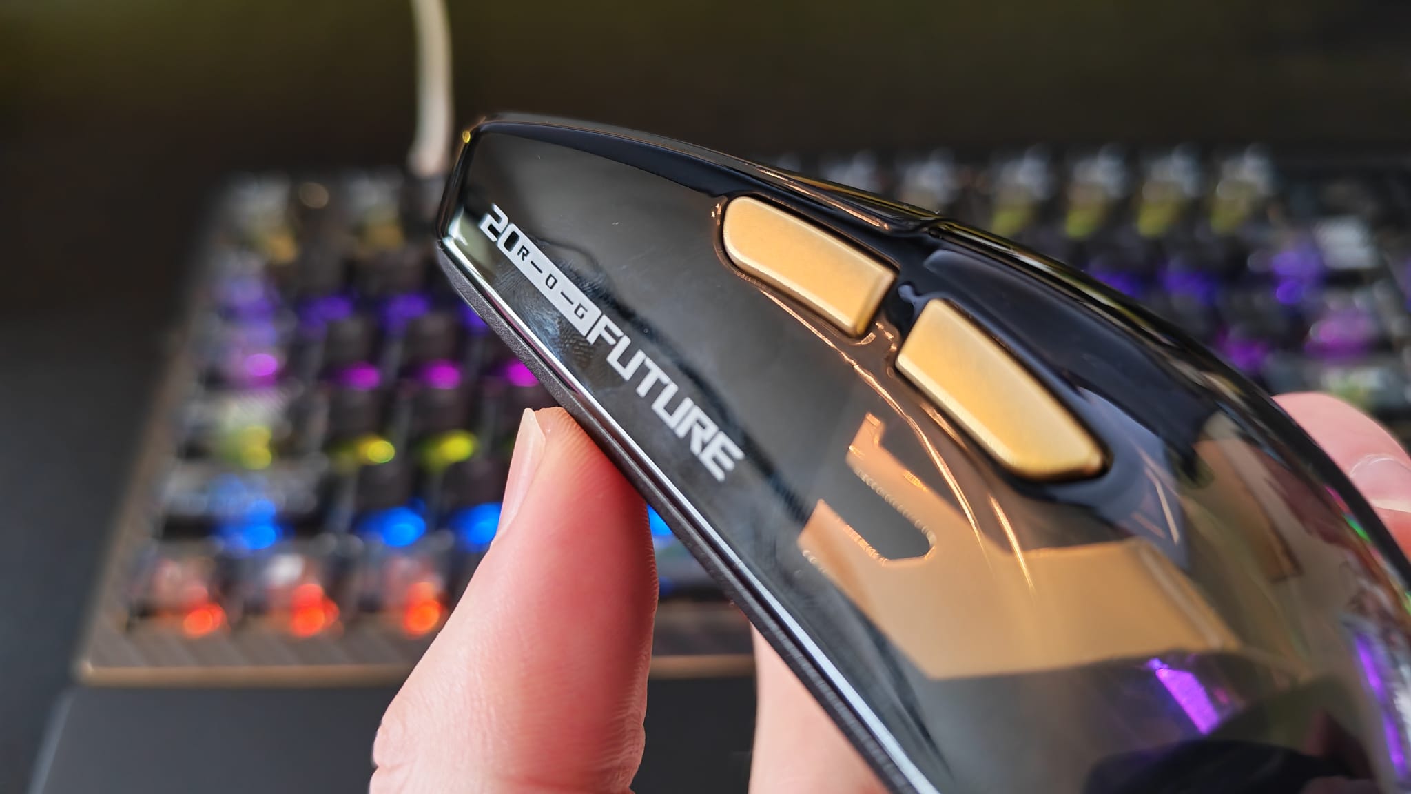 The side buttons and branding on the Asus ROG Harpe II Extreme Edition 20