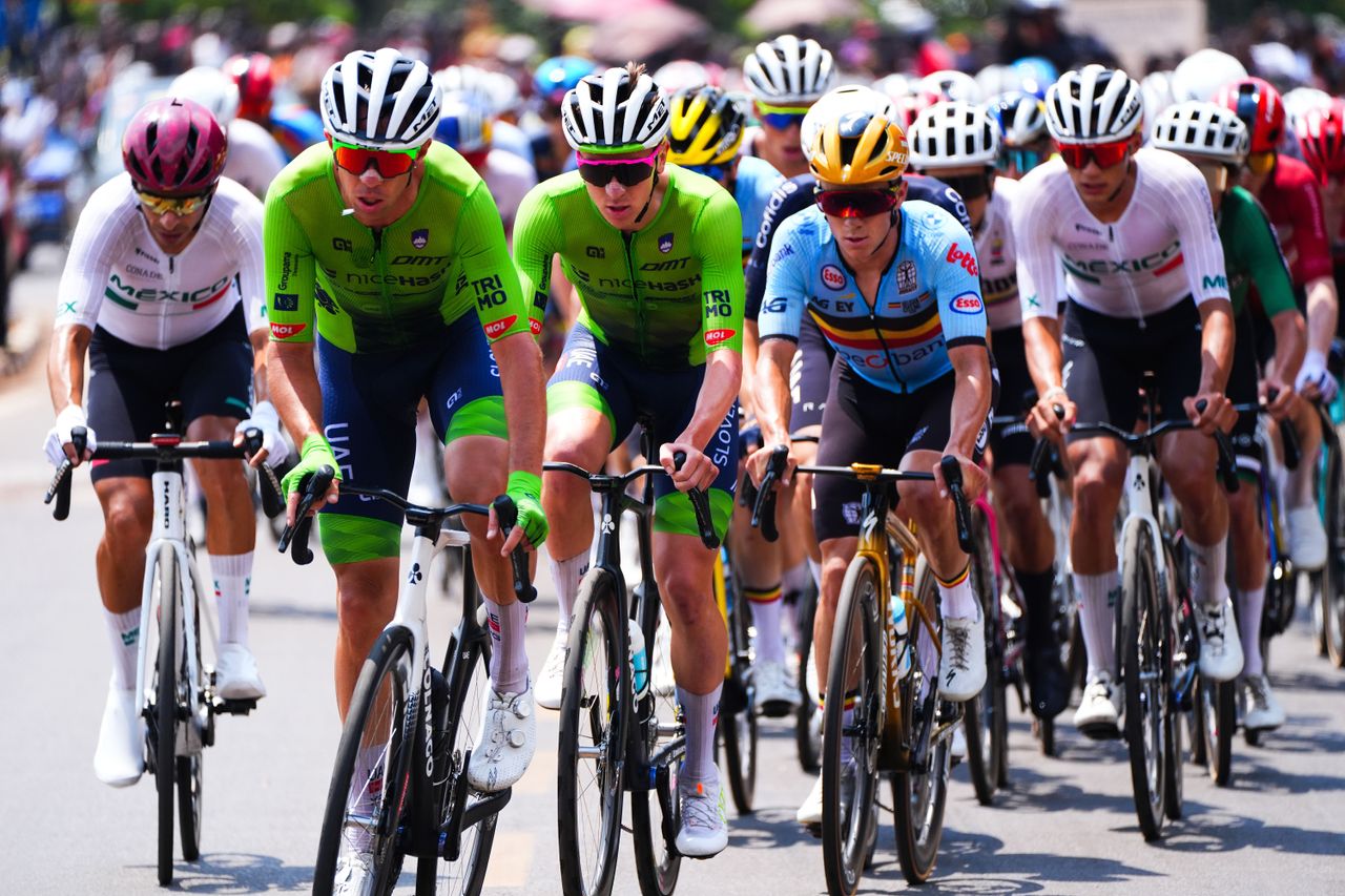 Tadej Pogacar (Slovenia) and Remco Evenepoel (Belgium) compete in the 267.5km Men's Elite Road Race during the 2025 UCI Cycling World Championships in Kigali, Rwanda