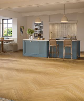 herringbone timber effect vinyl flooring in modern grey kitchen