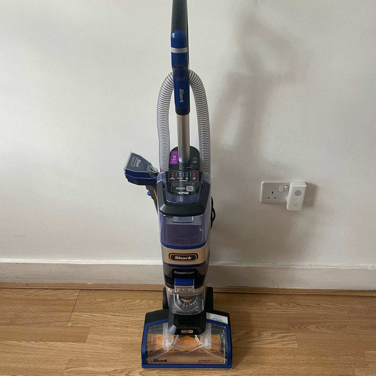 Shark CarpetXpert HairPro Pet Deep Carpet Cleaner with Spot Cleaner EX250UK assembled on laminate flooring in front of a white wall