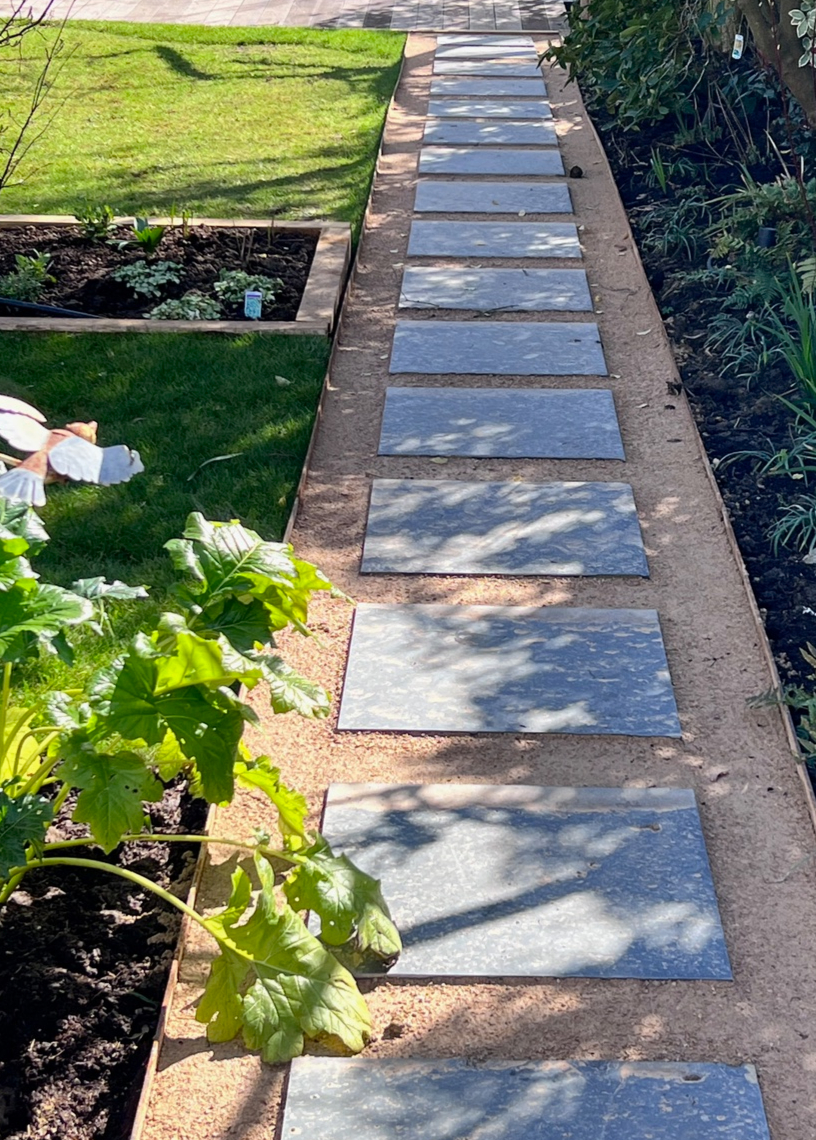 garden path with edging and spaced slabs