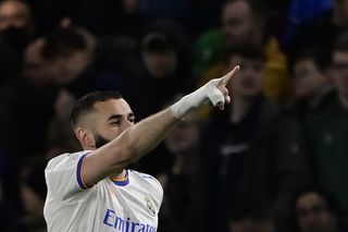 Karim Benzema celebrates after scoring for Real Madrid against Chelsea in the Champions League in April 2022.