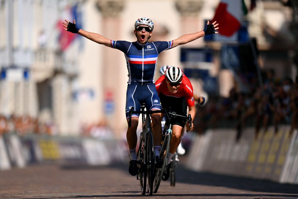 TRENTO ITALY SEPTEMBER 10 Romain Gregoire of France celebrates winning ahead of Per Strand Hagenes of Norway during 27th UEC Road Cycling European Championships 2021 Junior Mens Road Race a 1056 Km race from Trento to TrentoPiazza Duomo UECcycling on September 10 2021 in Trento Italy Photo by Justin SetterfieldGetty Images