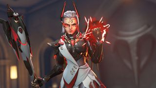 Overwatch 2 character Mercy wearing new red and black Talon mythic skin clenching her fist