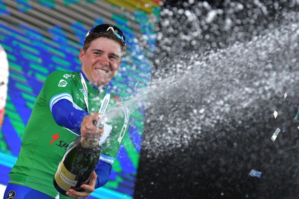 Remco Evenepoel sprays the champagne