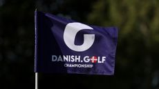 A navy blue Danish Golf Championship flag