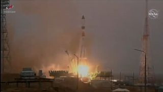 A Russian Soyuz rocket launches the uncrewed Progress 77 cargo ship toward the International Space Station from Baikonur Cosmodrome, Kazakhstan on Feb. 15, 2021 local time (Feb. 14 EST).
