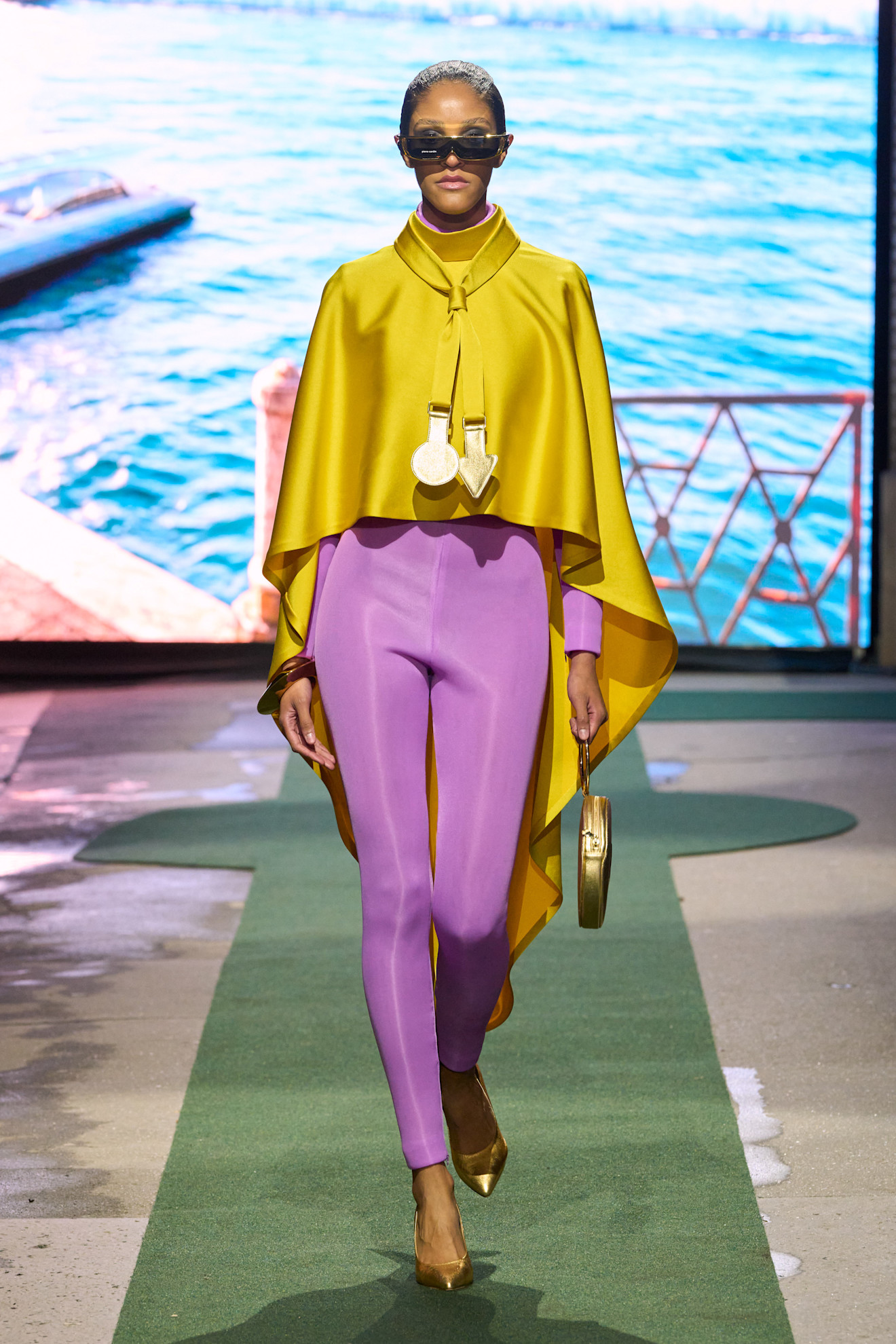 A model wore the acid yellow color trend on the Pierre Cardin Fall 2026 runway