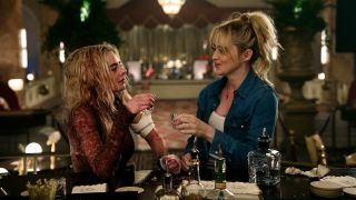 Samara Weaving and Kathryn Newton taking shots together in READY OR NOT 2: HERE I COME