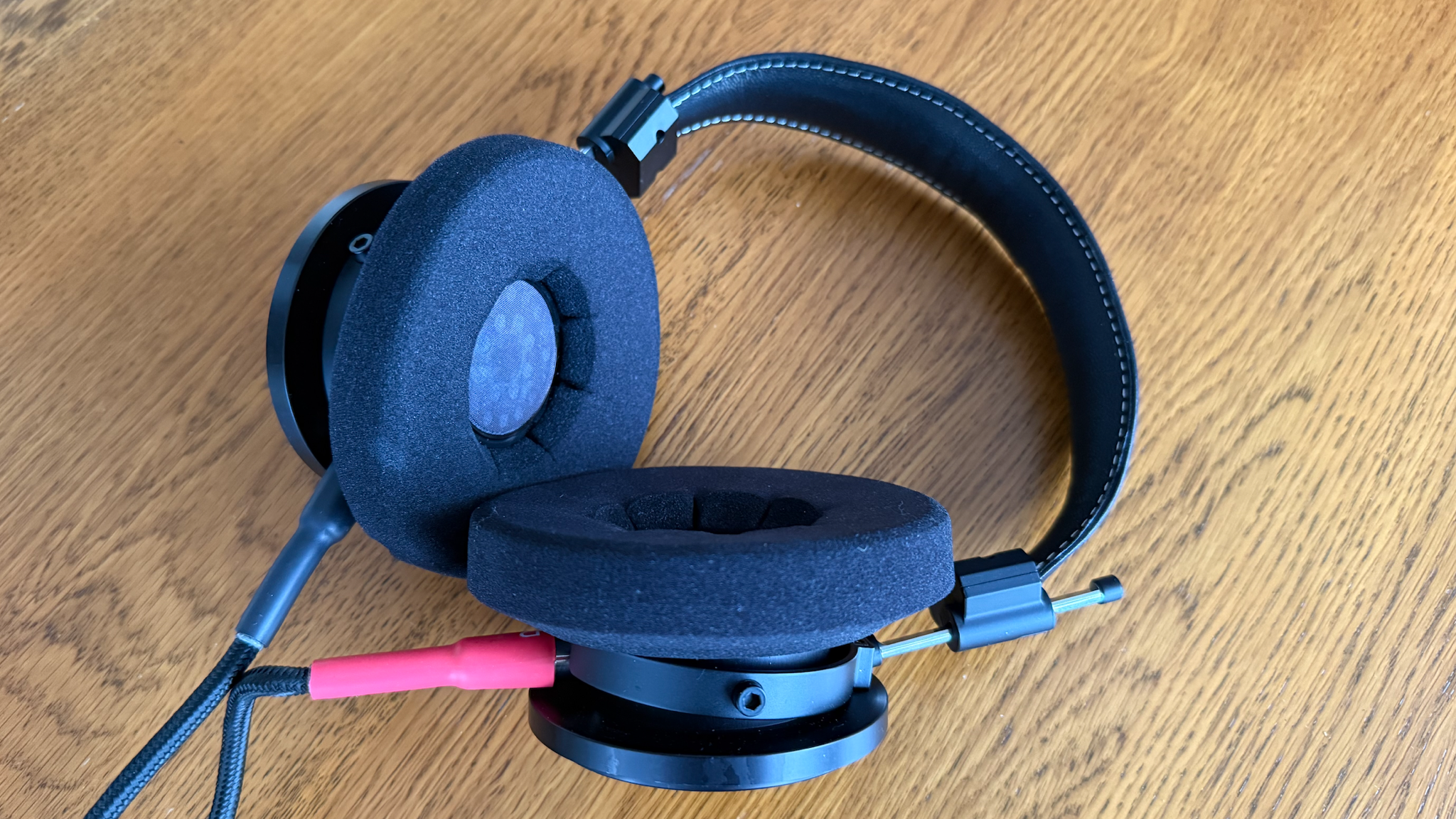 Grado Signature S750 headphones shot from above on a wooden surface