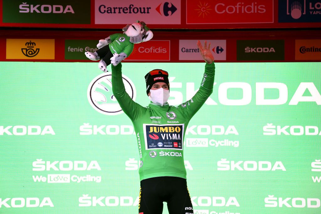 VINUESA SPAIN OCTOBER 22 Podium Primoz Roglic of Slovenia and Team Jumbo Visma Green Points Jersey Celebration Mascot Mask Covid safety measures during the 75th Tour of Spain 2020 Stage 3 a 1661km stage from Lodosa to La Laguna Negra Vinuesa 1735m lavuelta LaVuelta20 La Vuelta on October 22 2020 in Vinuesa Spain Photo by David RamosGetty Images