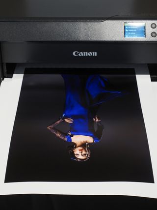 Canon ImagePrograf Pro-1100 printer in a wooden-interior studio, printing photographs