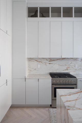 A kitchen with vinyl plank flooring