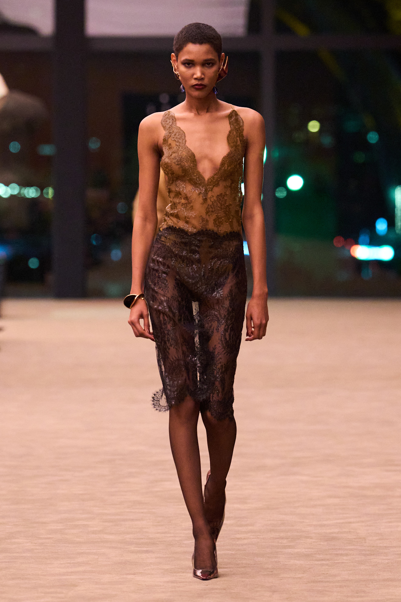 a model walks the saint laurent f/w 26 runway.